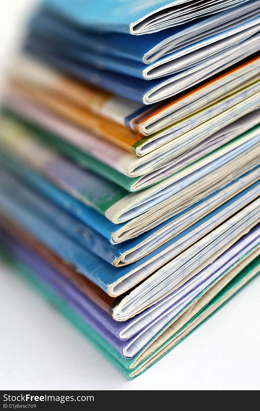 Stack of old writing-books on a light background