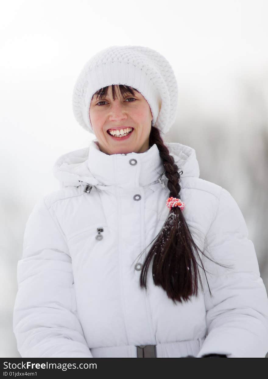 Winter portrait of a happy girl - Shallow DOF. Winter portrait of a happy girl - Shallow DOF