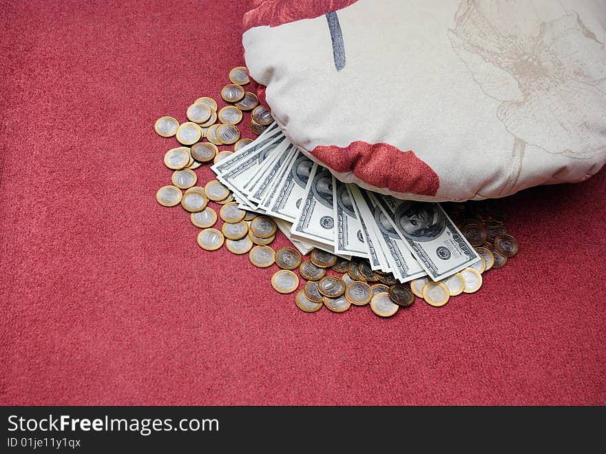 Russian rubles and american dollars are stored under pillow. Russian rubles and american dollars are stored under pillow