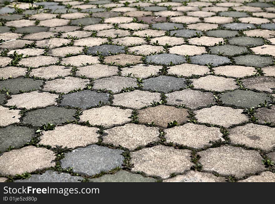 Hexagonal Brick Grunge brown and gray flagstones