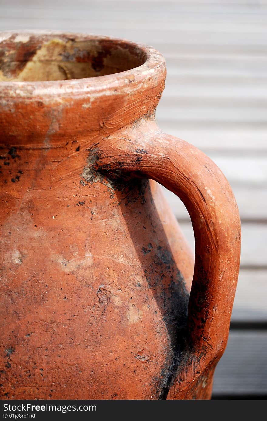 Ancient red amphora handle for beautiful background