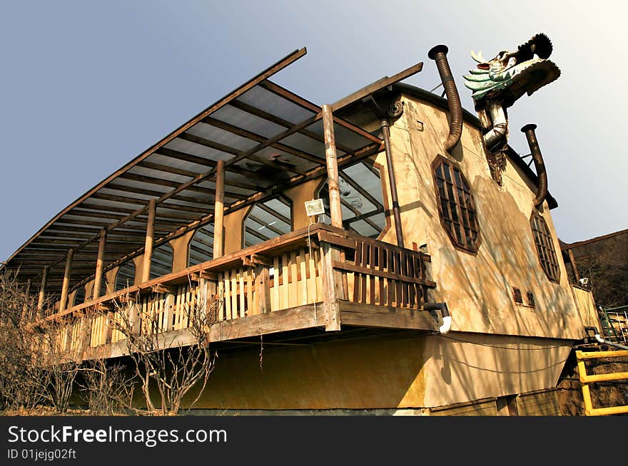 House with Wooden Balcony