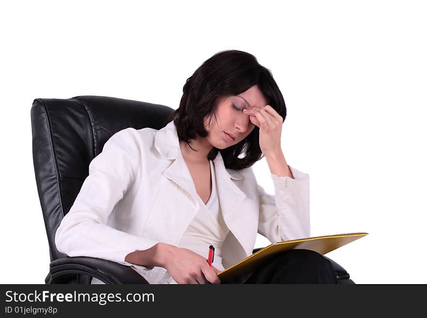 Young business woman sitting on the chair and holding a report in the same time having a big problem. Young business woman sitting on the chair and holding a report in the same time having a big problem
