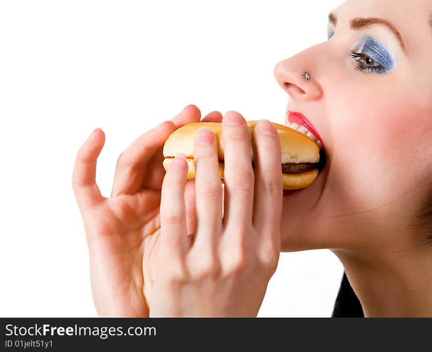 Attractive young lady eating burger. Attractive young lady eating burger