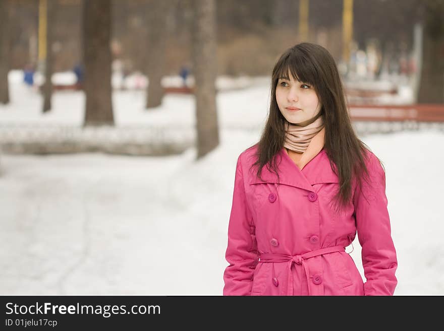 A portrait of sad young woman in the spring park. A portrait of sad young woman in the spring park