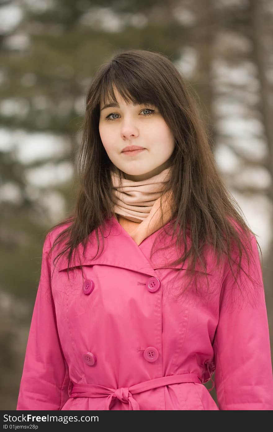 A portrait of sad young woman in the spring park. A portrait of sad young woman in the spring park