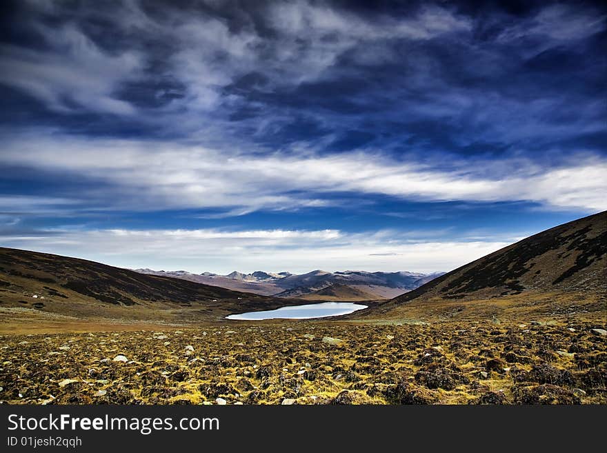 Lake and snow mountain in pamirs. 
xinjiang, china. Lake and snow mountain in pamirs. 
xinjiang, china.