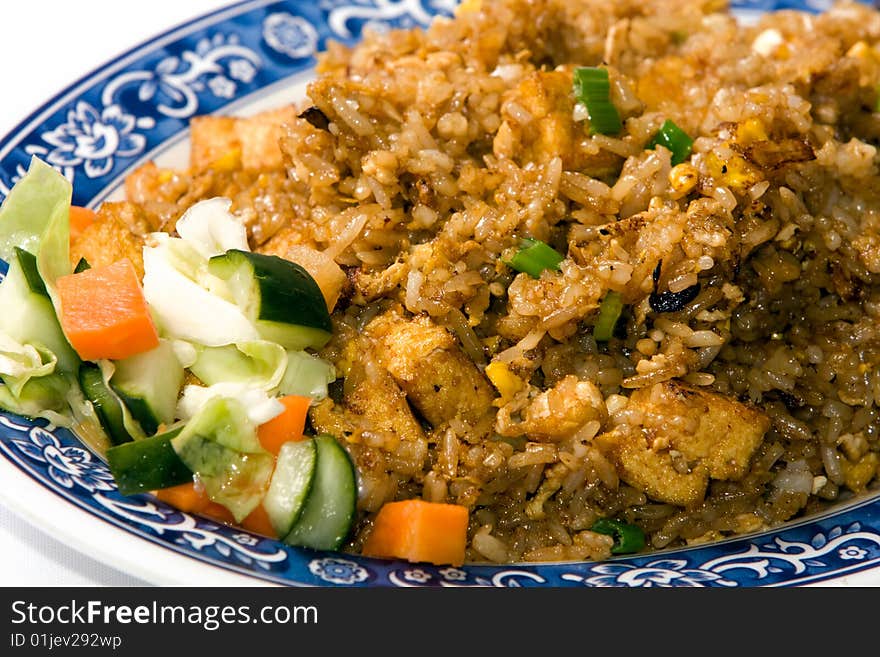 Traditional Asian food. Fried rice with vegetables. Traditional Asian food. Fried rice with vegetables.