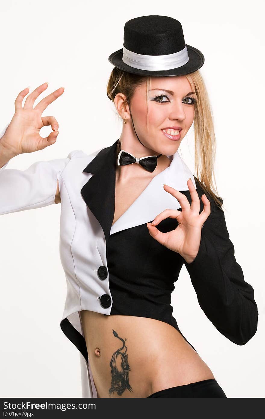 Sexy woman with small top hat making 'ok' gesture. Sexy woman with small top hat making 'ok' gesture