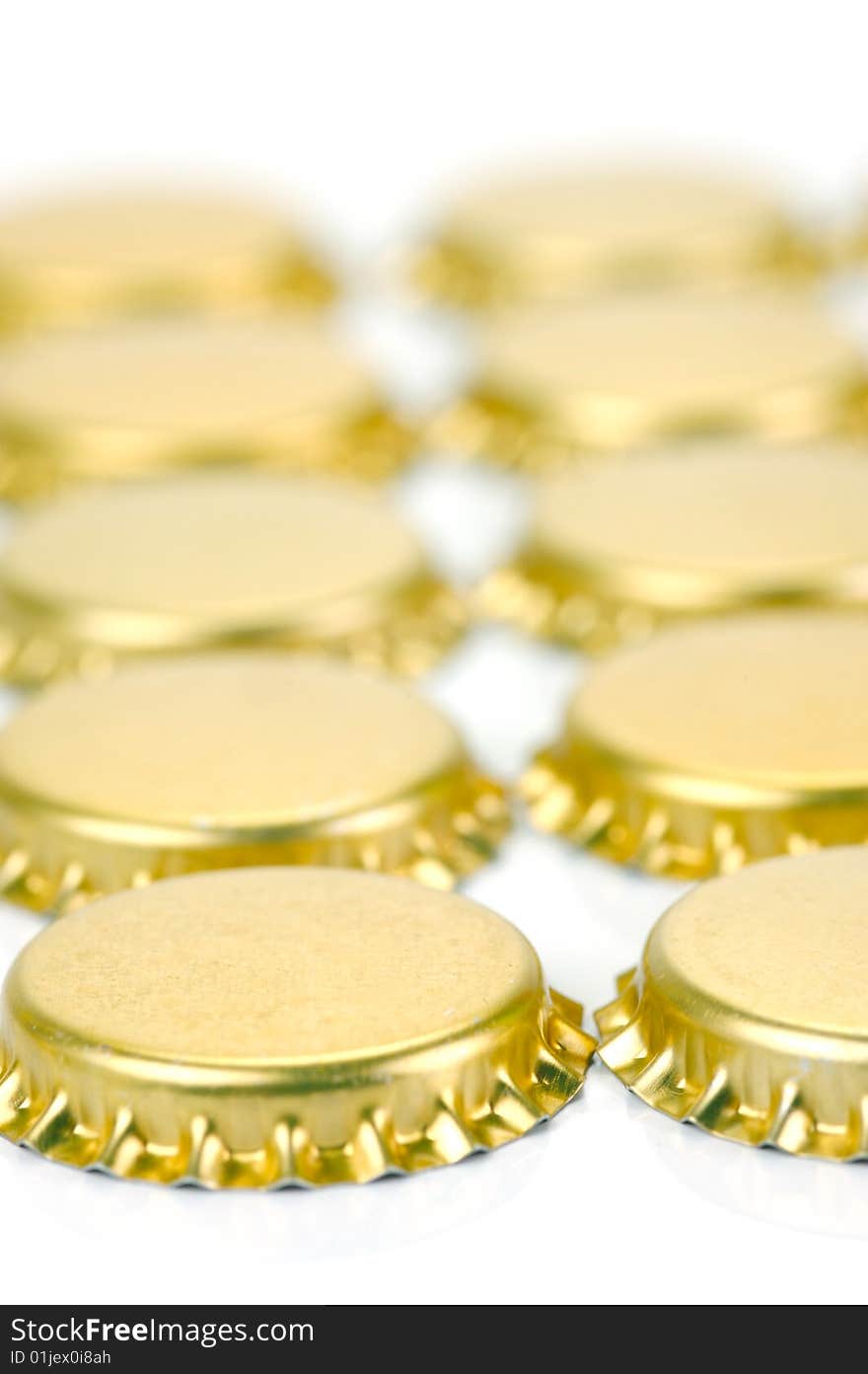 Bottle caps isolated against a white background. Bottle caps isolated against a white background