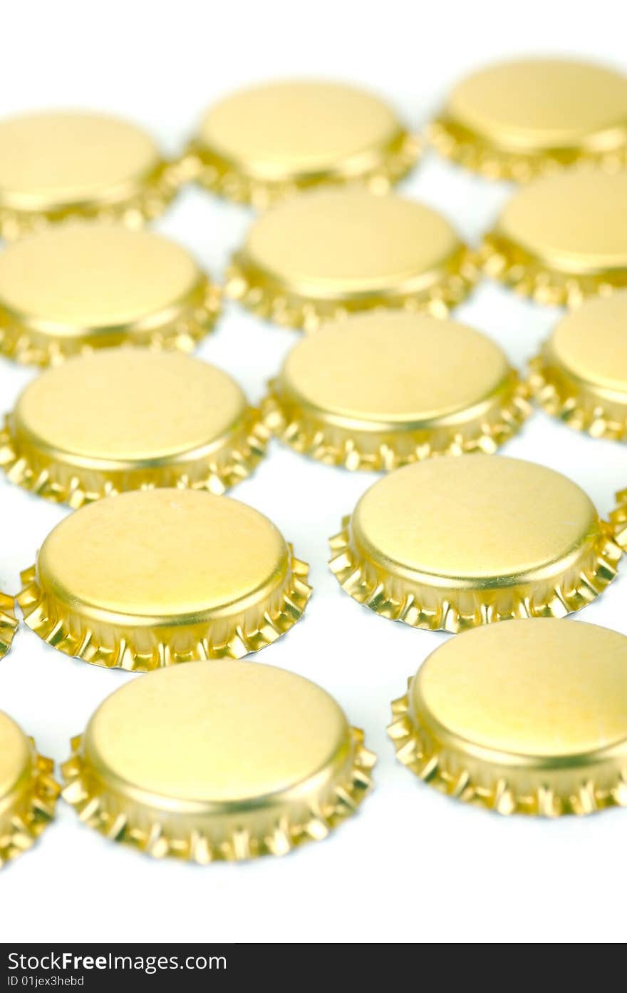 Bottle caps isolated against a white background. Bottle caps isolated against a white background