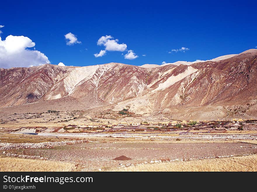 It is the landscape of Tibet in China. A nature village in the mountain,with blue sky.
film: Koda E100vs, time: 2006-10.