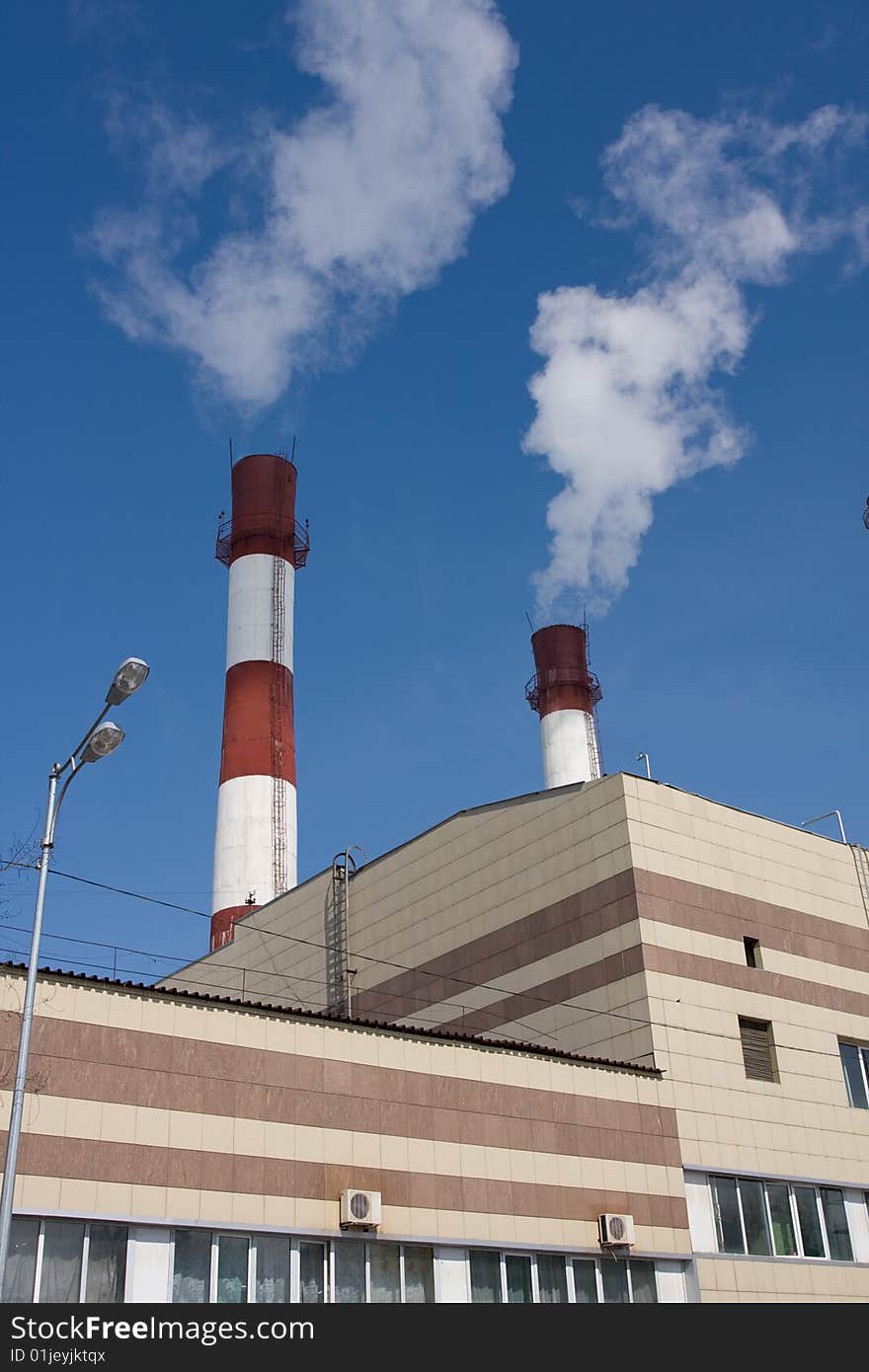 Smoke coming out of an industrial pipes. Smoke coming out of an industrial pipes