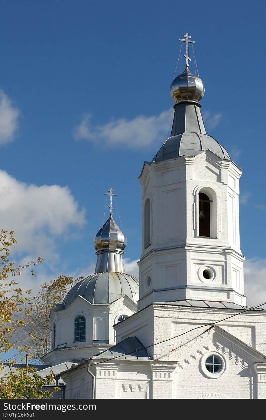 Light cathedral with domes on a blue background. Light cathedral with domes on a blue background