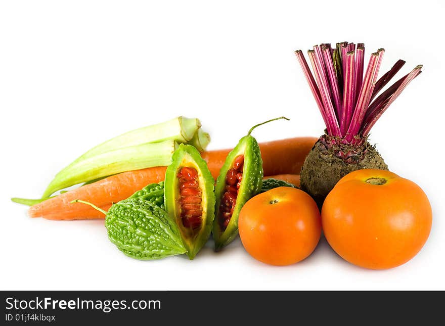 Some fresh and colorful vegetables on white background.