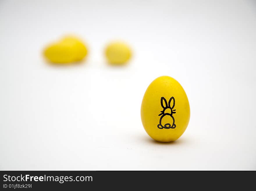 Yellow easter egg whit a bunny