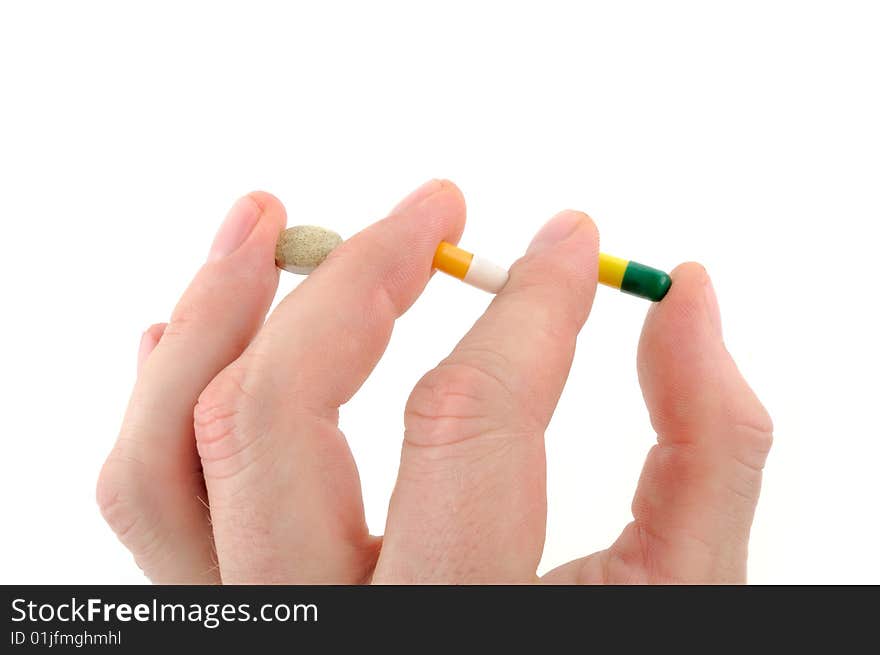 A Human finger holding Medicine