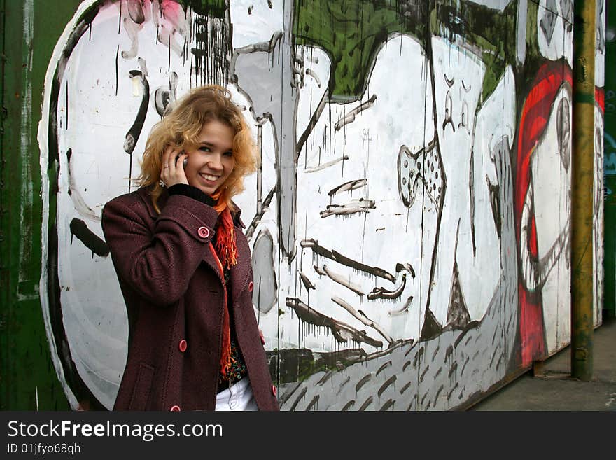 Girl talking by phone outdoor