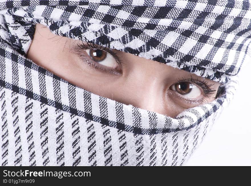 Closeup portrait of pretty arabic woman with headscarf