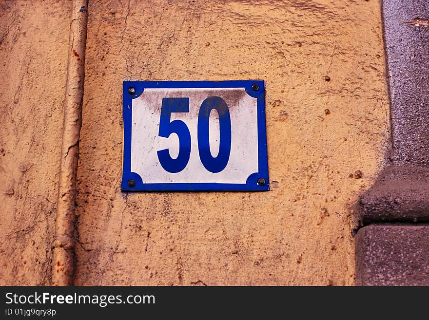 Old dusty street number