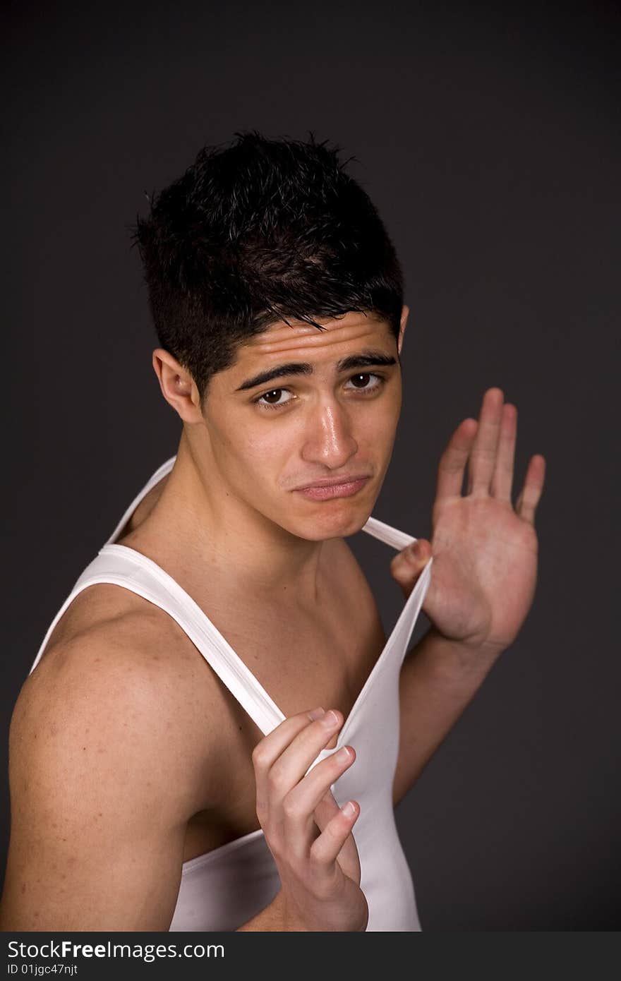 Fashion portrait of teenager over grey background