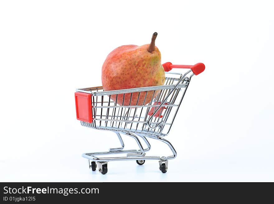 Pear in shopping basket isolated