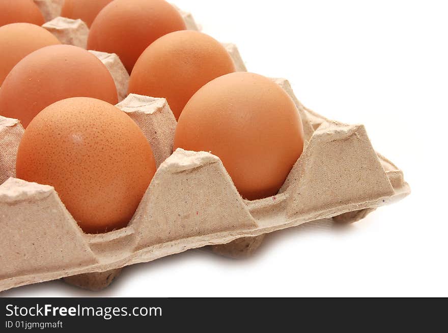 Eggs in tray  on a white isolated background