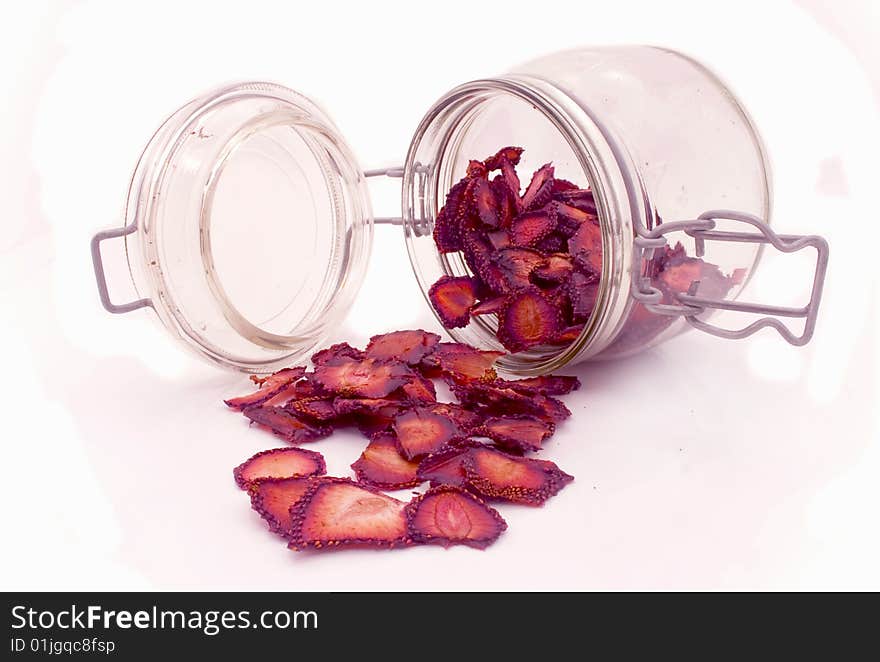 Dry strawberry got enough sleep from a glass jar. Dry strawberry got enough sleep from a glass jar