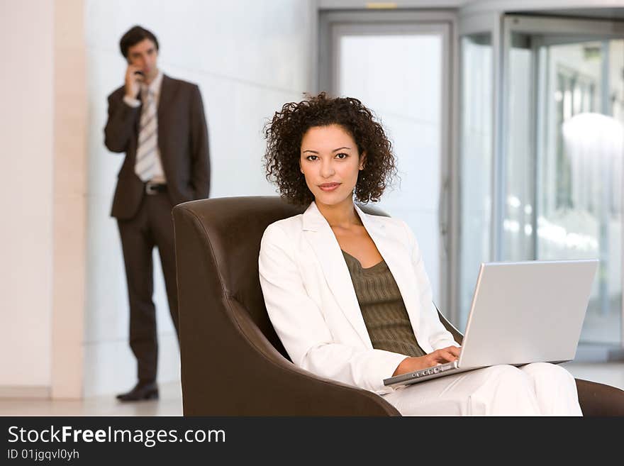 Attractive Business Woman Working On Laptop