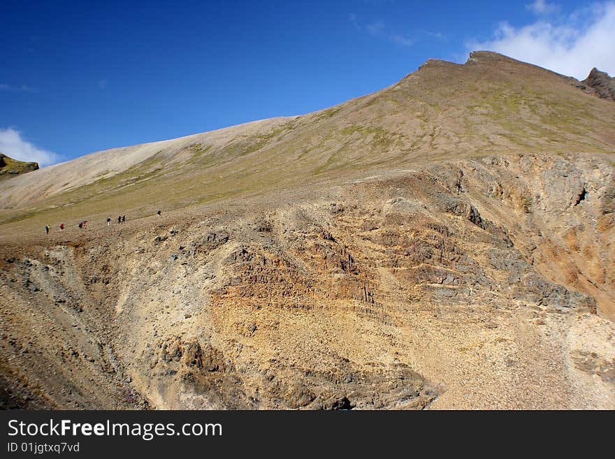 This picture represents the difficulty of trekking and walking up a mountain in Iceland. This picture represents the difficulty of trekking and walking up a mountain in Iceland