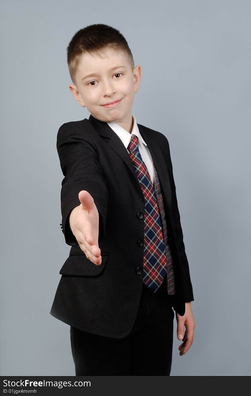 Small businessman ready to shake hands