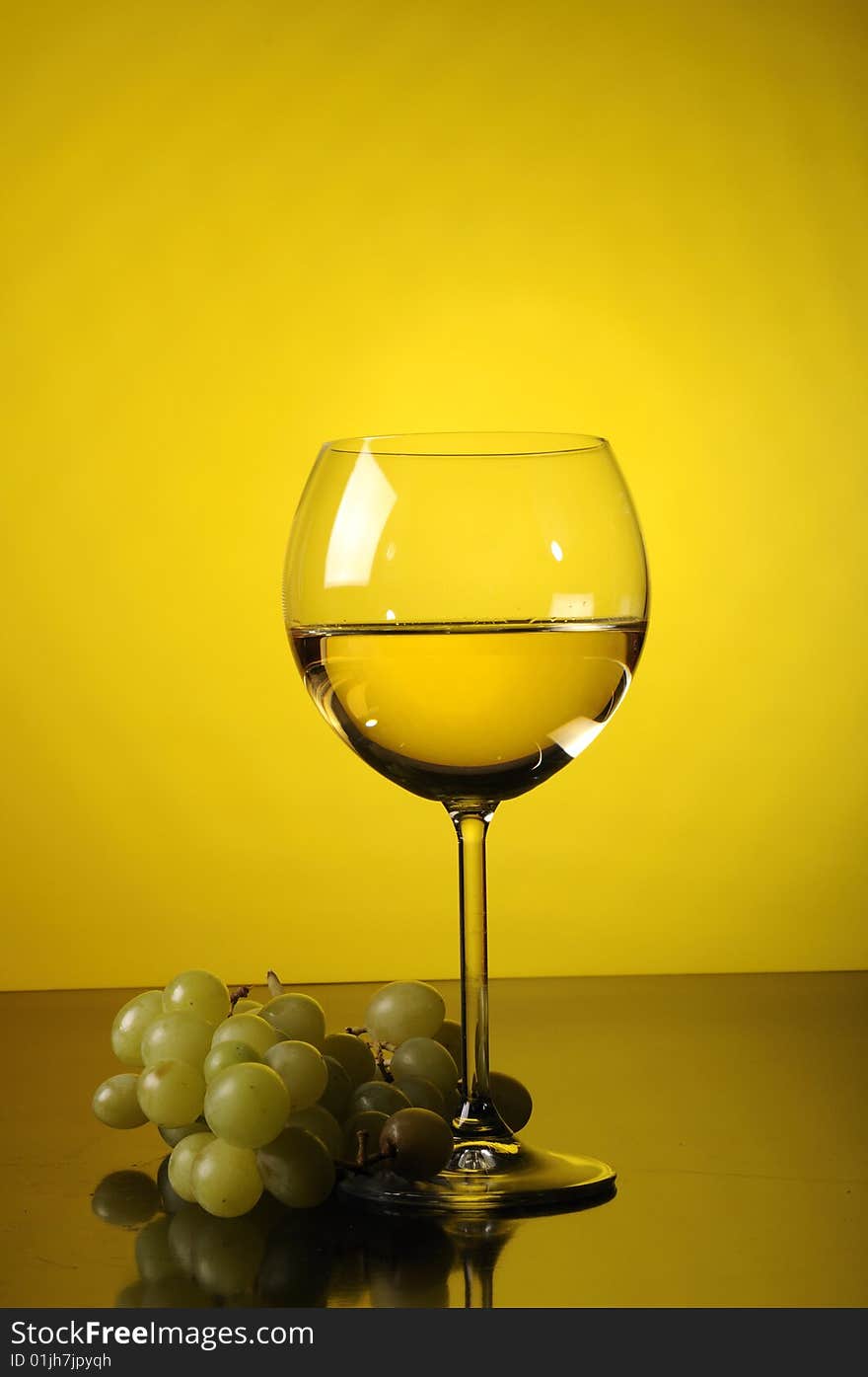 Grapes and glass of wine