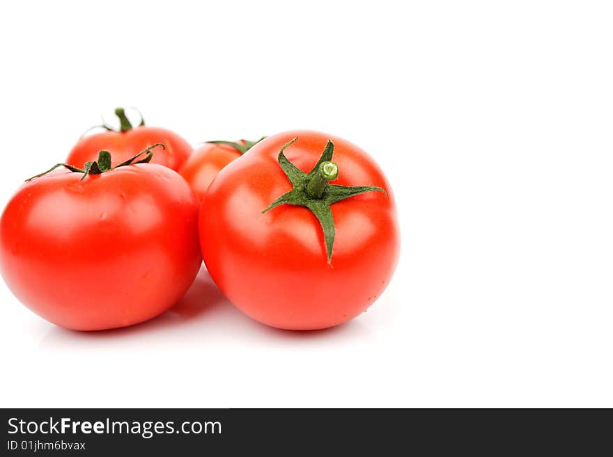 Delicious red tomato in white background