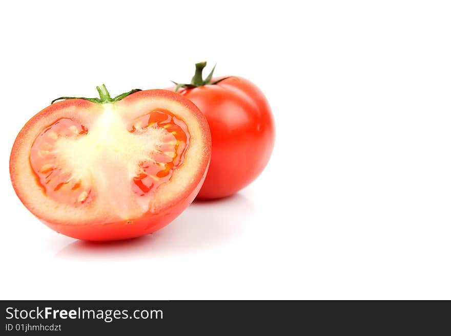 Delicious red tomato in white background