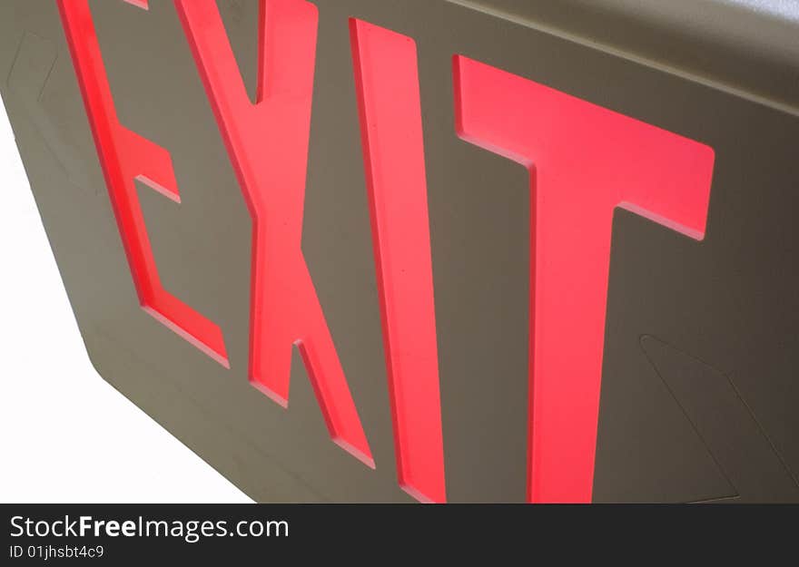 Exit sign on white at an angle