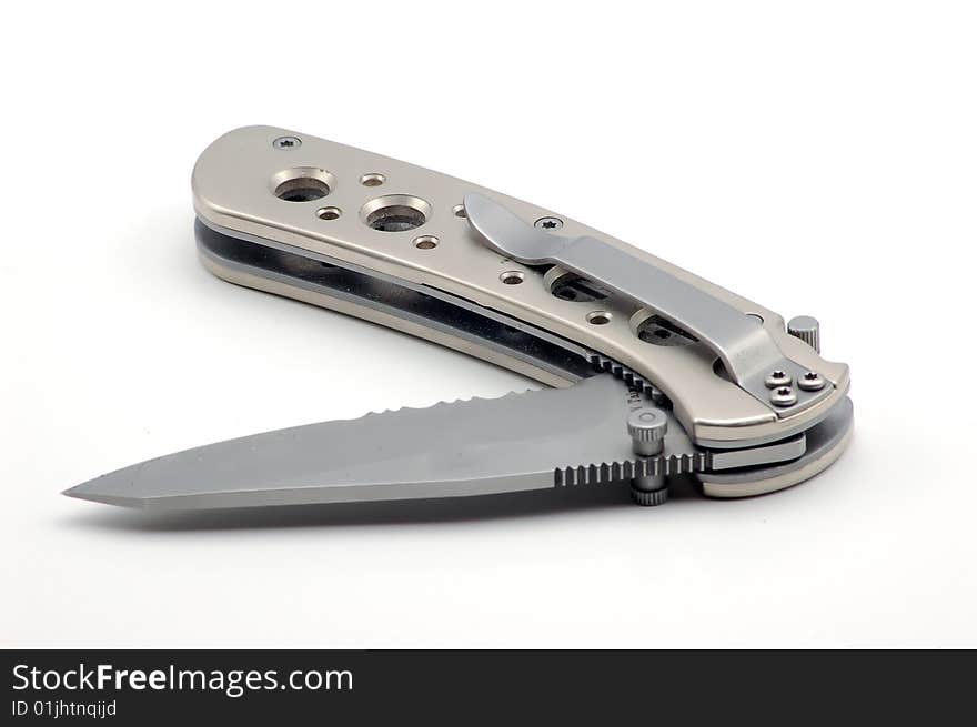 A close up of a slick pocket knife. A close up of a slick pocket knife.