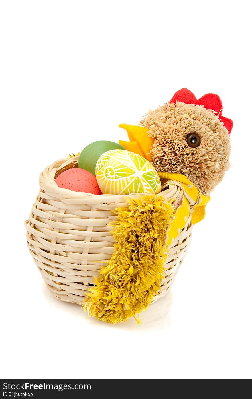 Hen shaped basket with hand colored easter eggs. Hen shaped basket with hand colored easter eggs