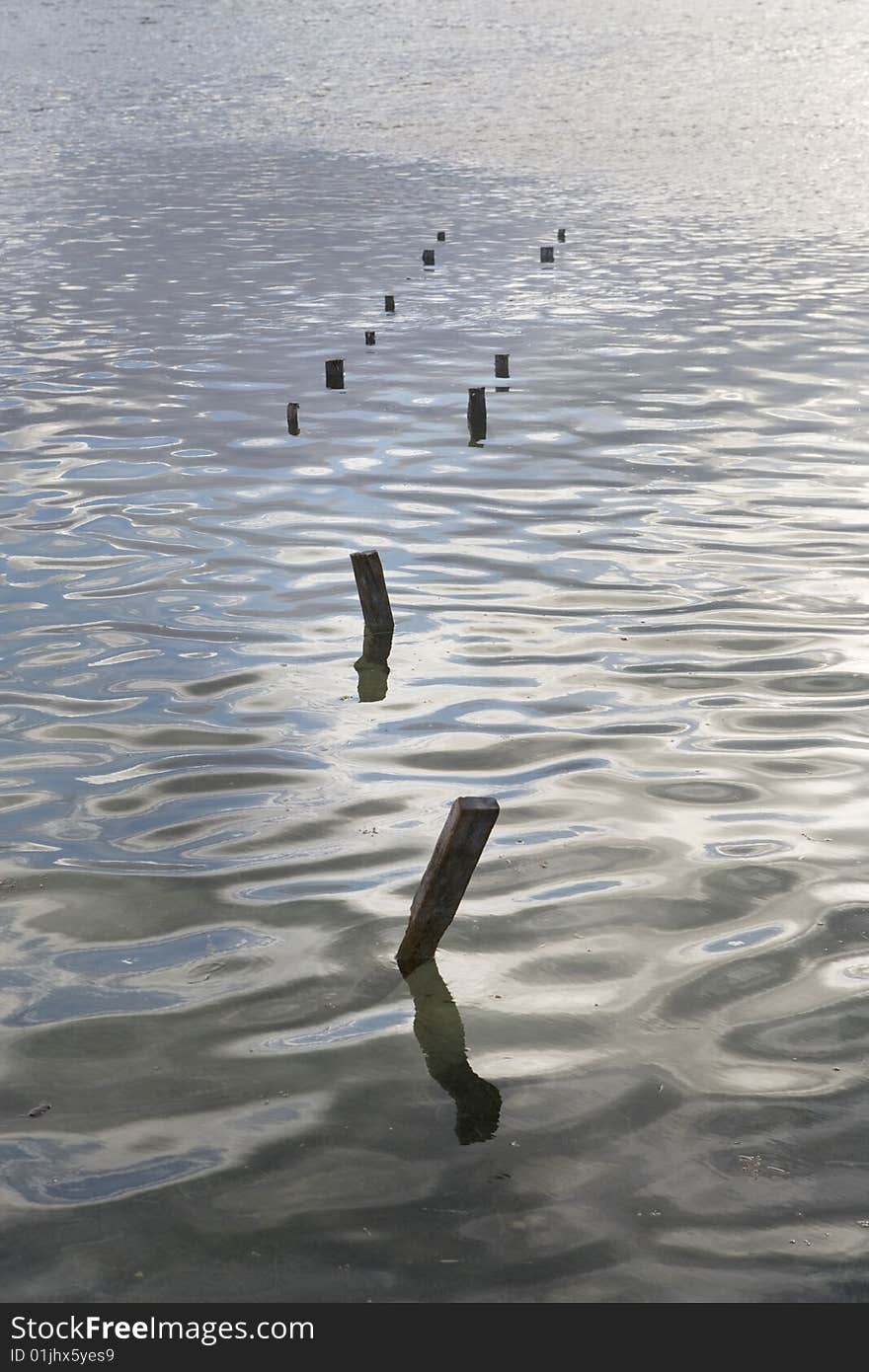 Calm Waters And Pier Remnants