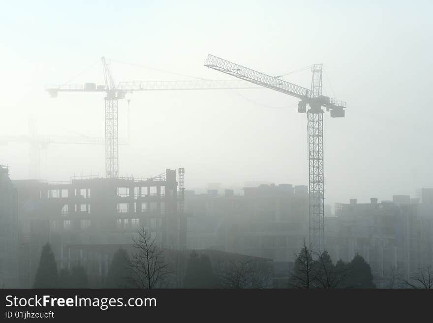 Construction on a foggy morning