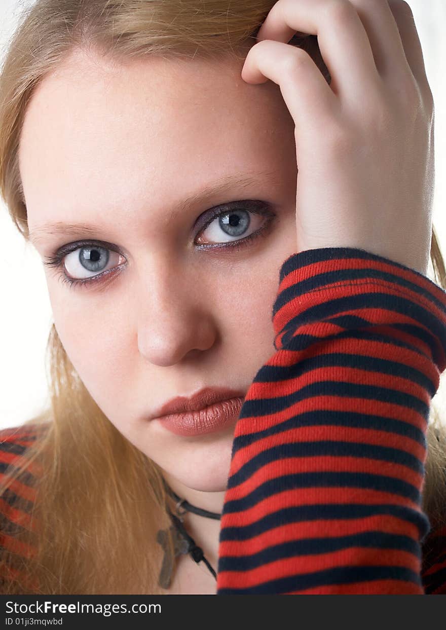 Fair hair young woman portrait, studio shot. Fair hair young woman portrait, studio shot