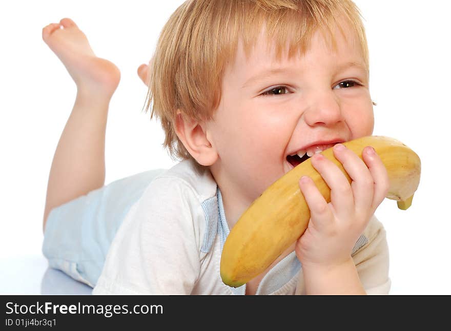 Little beautiful boy eat banana. isolated on white. Little beautiful boy eat banana. isolated on white.