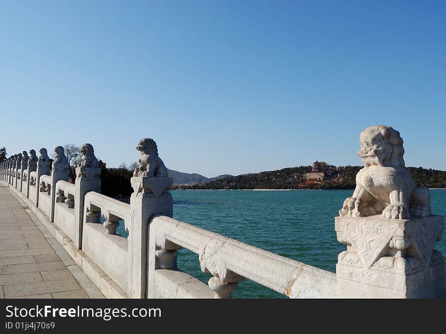 Stone lions on the bridge in summer palace. Beijing. Stone lions on the bridge in summer palace. Beijing.