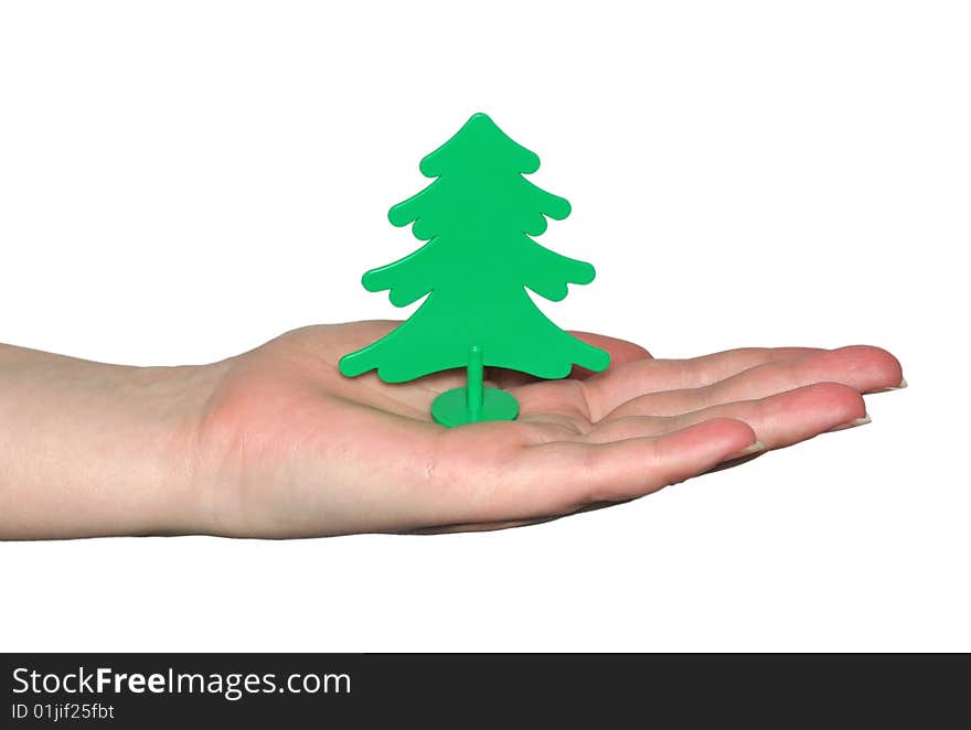 The Plastic tree in hand on white background. The Plastic tree in hand on white background.