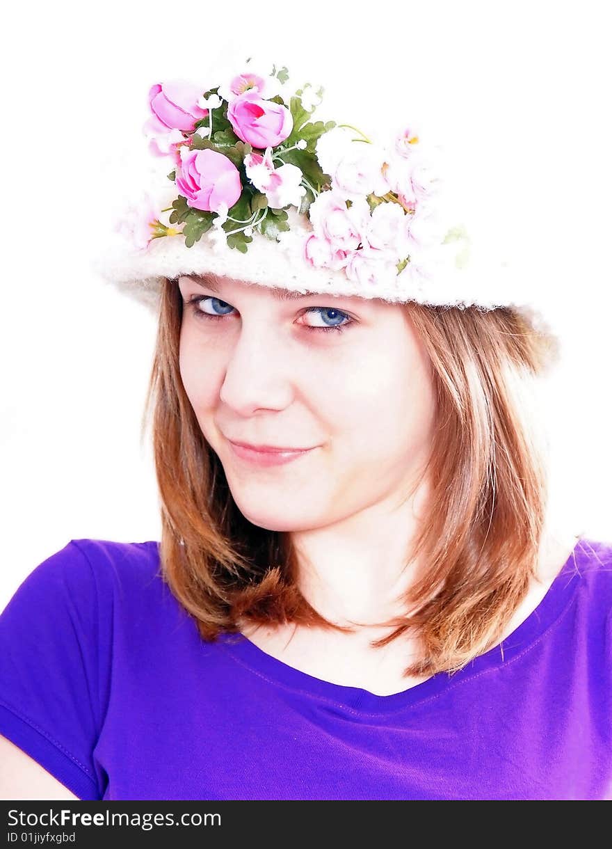 Studioshot of a young beautiful woman wearing an old fashion hat, isolated on white background. Studioshot of a young beautiful woman wearing an old fashion hat, isolated on white background