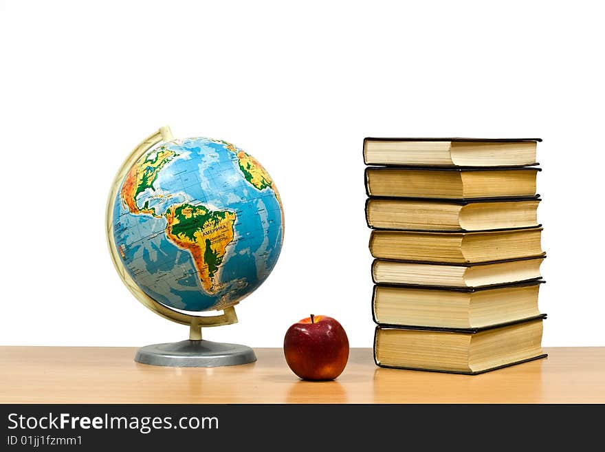 Books on a table on a white background. Books on a table on a white background