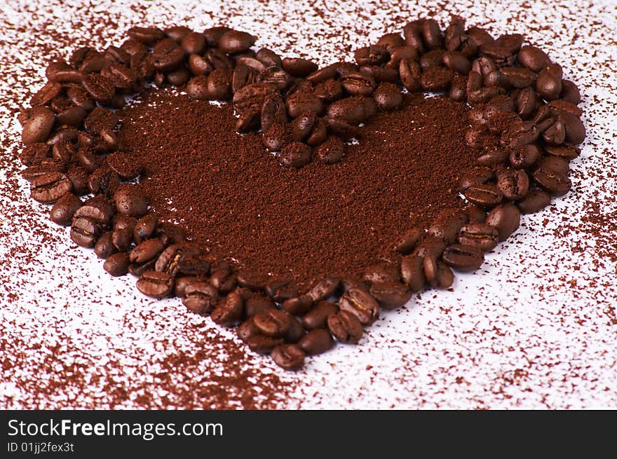 A heart out of fresh and tasty coffee beans. A heart out of fresh and tasty coffee beans