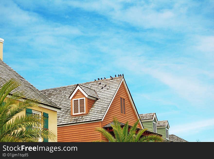 Roof tops with the blue sky in the background. Roof tops with the blue sky in the background