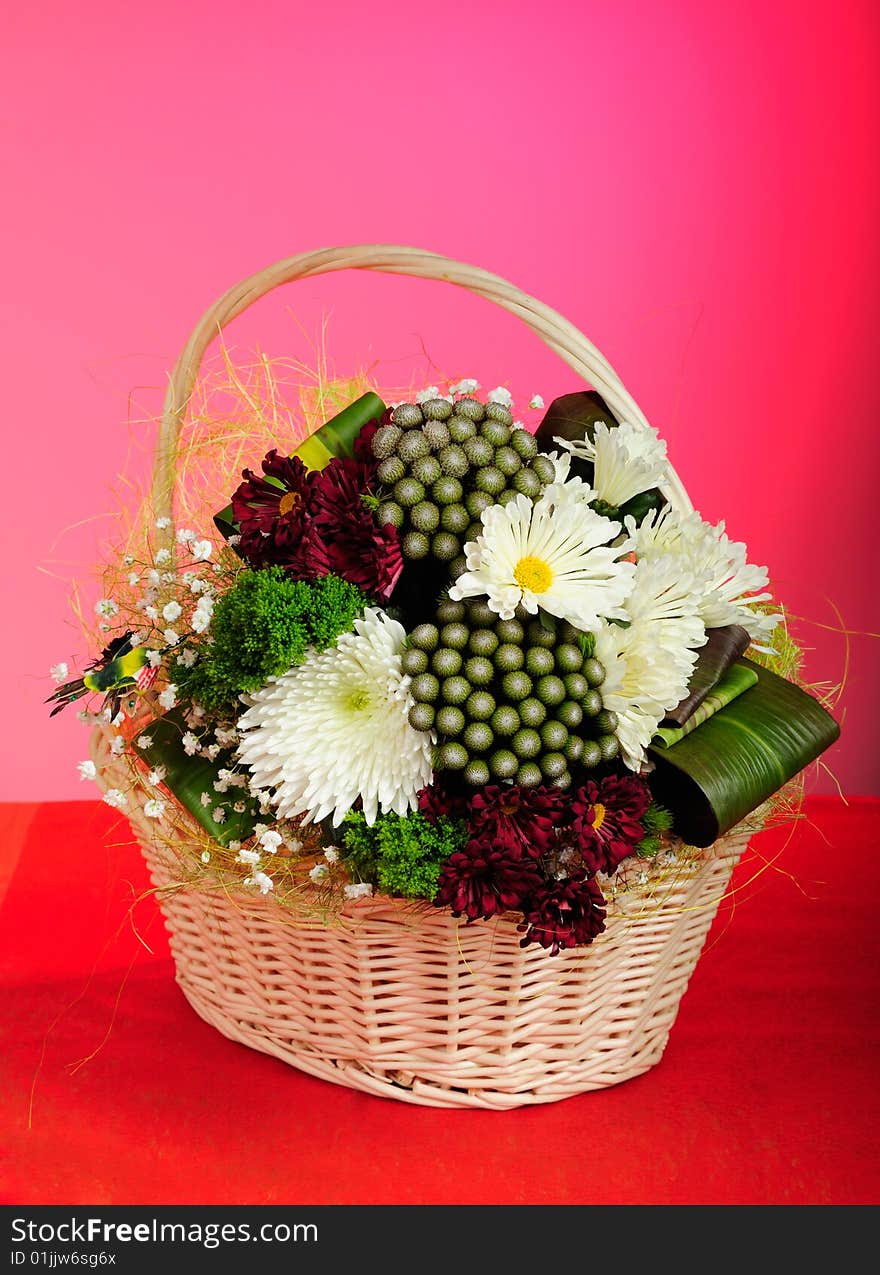 Bunch of flowers in wicker basket