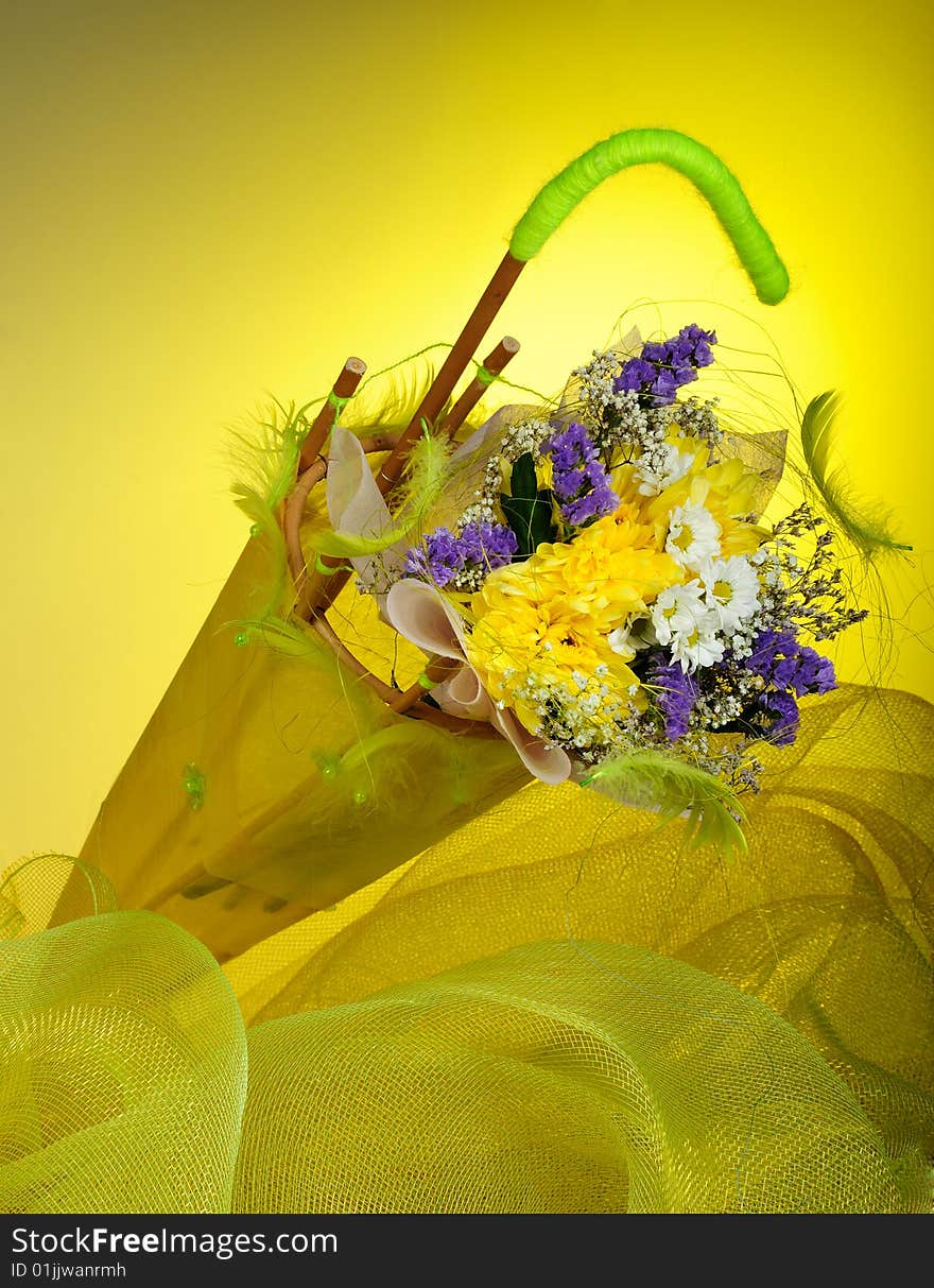 Bunch of flowers in umbrella