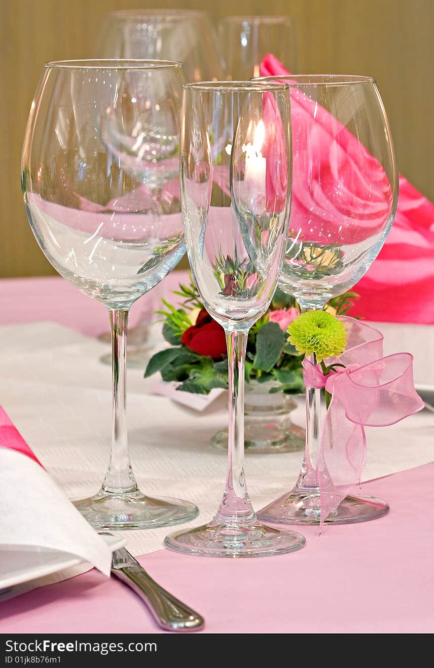 Wedding table decorated with bouquet and candles. Wedding table decorated with bouquet and candles